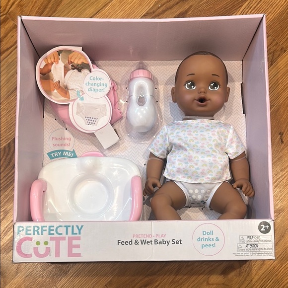 Perfectly Cute Brown Baby Doll Set with bottle toilet & color change diaper new - Picture 1 of 6